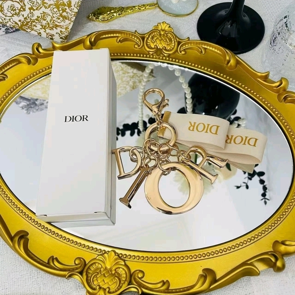 Dior Gold Keychain with Cream Accents